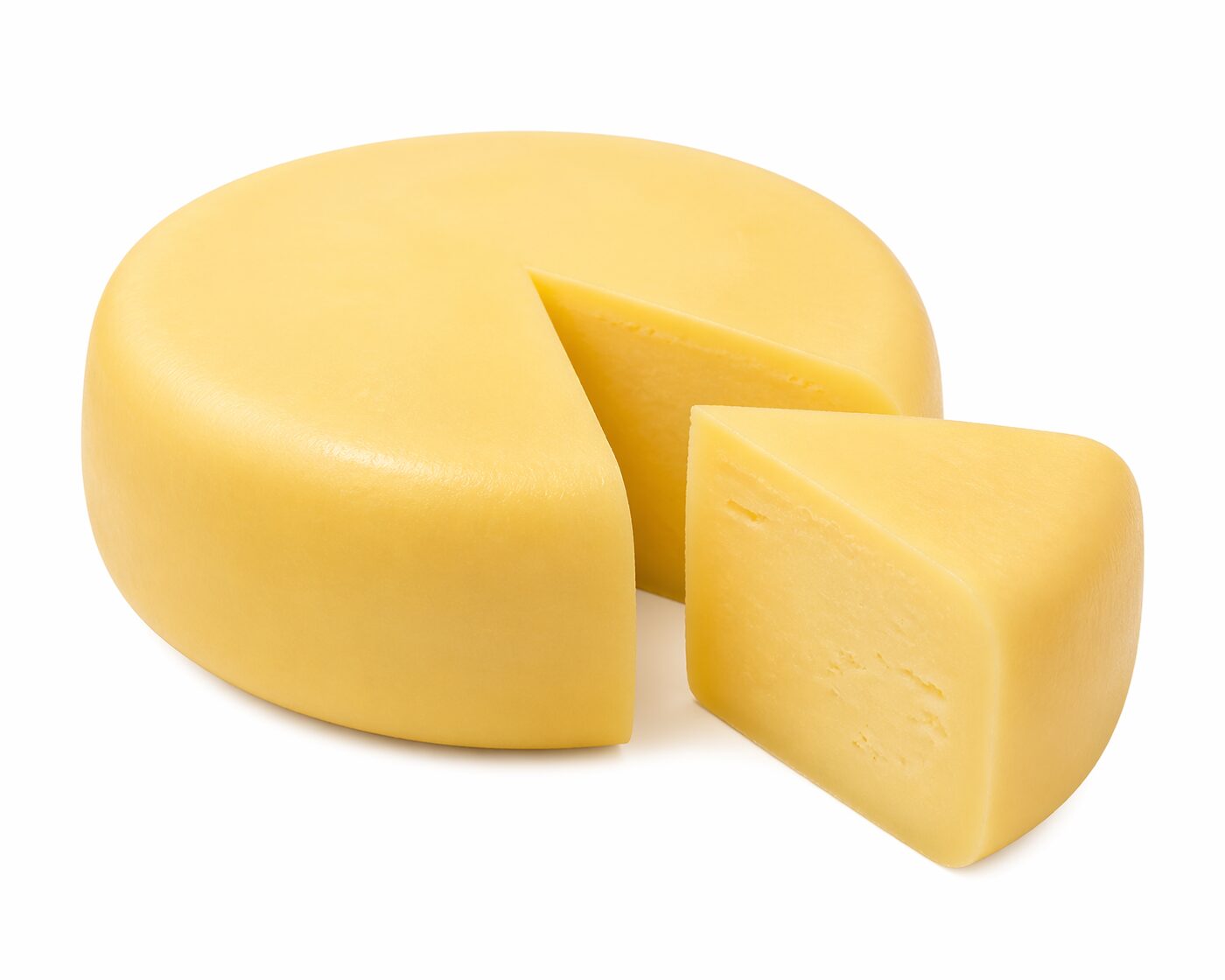 Block kashkaval cheese wheel with wedge cut