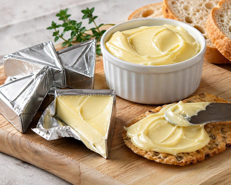 Spreadable processed cheese in a tub